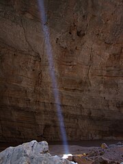 The cave chamber Majlis al Jinn, believed to be a gathering place of the jinn in Omani lore Majlis al Jinn - Descending into cave.jpg
