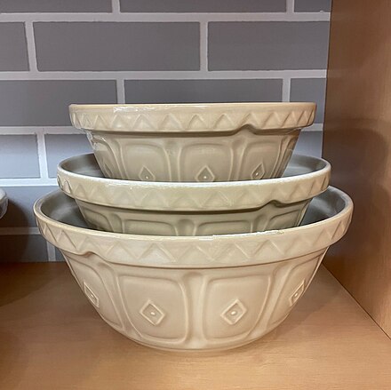 Three contemporary stoneware mixing bowls