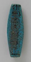 Molded Faience Amuletic Tube with Throne Name of the High Priest of Amen Menkheperre LACMA M.80.198.107.jpg