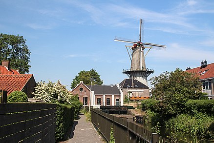 The windmill Nooitgedacht overlooking the city centre of Spijkenisse.