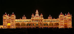 Golden 5-storey Mysore Palace building with 21 domed towers and central spire