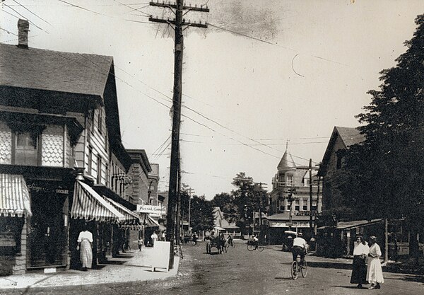 Historic Oyster Bay photo ca. 1890 showing Snouder's Drug Store in left foreground, Moore's Building in right background, and Fleet's Hall to the right of that in the foreground. Oyster Bay Fleet's Hall Historic.jpg