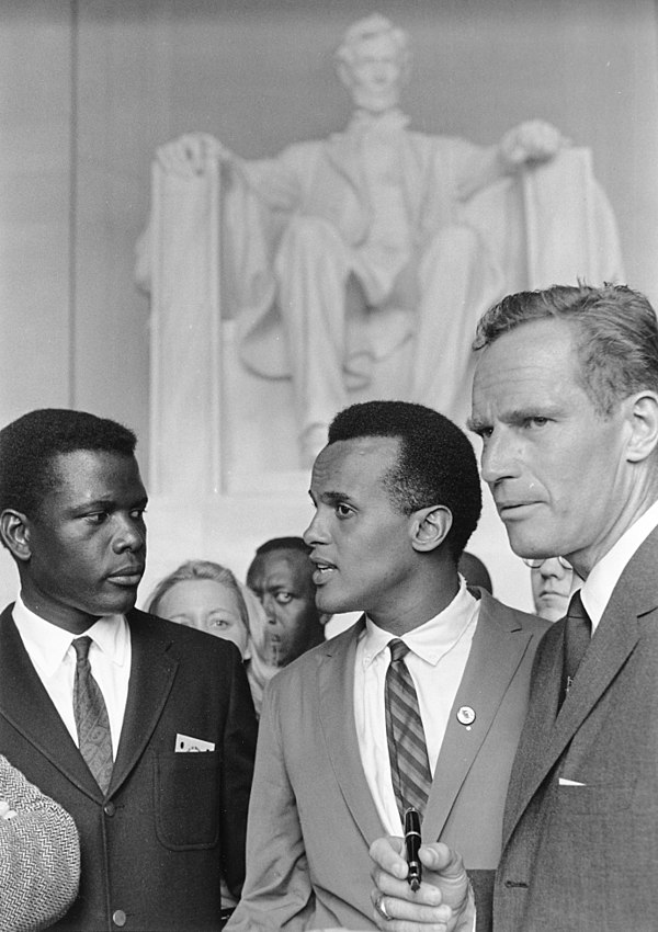 Poitier at the 1963 March on Washington for Jobs and Freedom, alongside actors Harry Belafonte and Charlton Heston