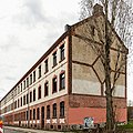 Doppelmietshaus in halboffener Bebauung und Waschhaus im Hof