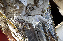 Bowen works on the SARJ during the mission's third spacewalk. STS-126 EVA4 Bowen.jpg