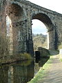 Saddleworth Viaduct carries the Manchester-Huddersfield railway over the canal between Saddleworth and Dobcross