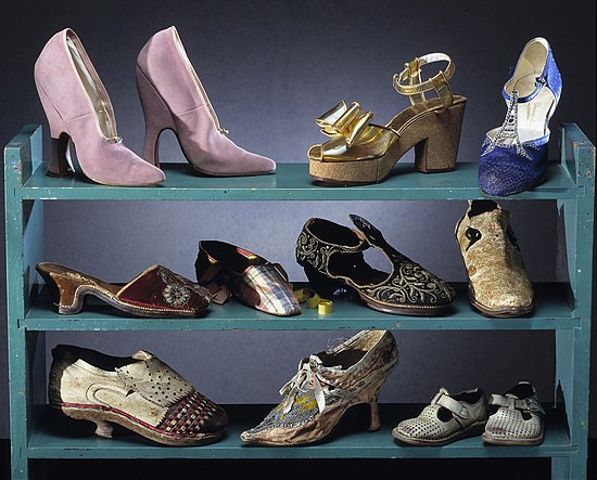A variety of shoes displayed at the Nordic Museum, including models from 1700 to the 1960s.