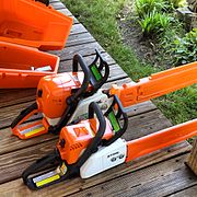 Stihl gasoline-powered chainsaws: MS 170 (foreground), MS 290 Farm Boss (background)