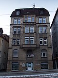 Tenement house with shop