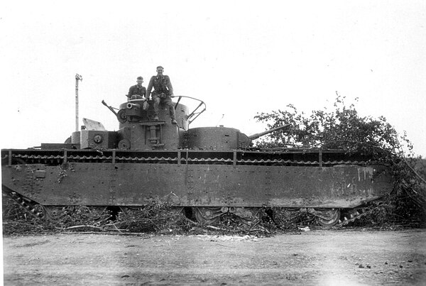 German troops posing on a captured T-35, unknown date. The impressive size of this tank made it an object of interest to the pursuing German personnel