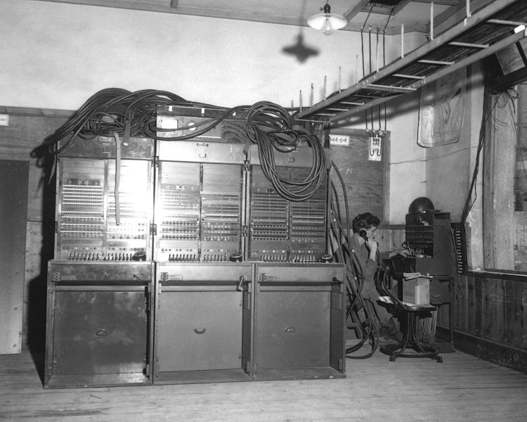 File:Three BD-110A switchboards on left and one BD-96 on extreme right being operated by Pfc. James Grahn of Co HD-SN-99-03067.jpg