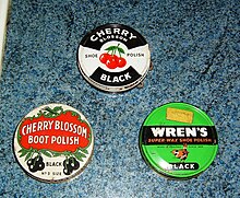 Three common types of British shoe polish of the 1960s or 1970s: two different versions of Cherry Blossom and a version of Wren's Three tins of shoe polish from the 1960s.jpg