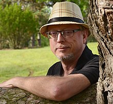 Waggoner in 2019 Tim Waggoner arm on tree.jpg