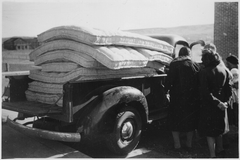 File:Truck loaded with mattresses - NARA - 285249.tif