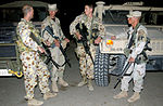 Australian Airfield Defence Guards with members of the USAF 447th Expeditionary Security Forces Squadron at Baghdad International Airport