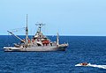 US Navy 050724-N-4772B-044 A rigid hull inflatable boat approaches the rescue and salvage ship USS Safeguard (ARS 50) in the Java Sea.jpg