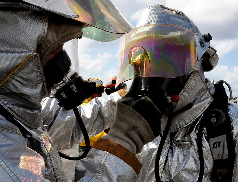 File:US Navy 080925-N-6854D-003 A Sailor checks a shipmate's fire fighting equipment.jpg