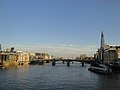 The view eastwards from en:Millennium Bridge, London, Southwark (borough), London. Tower Bridge can just about be seen in the distance, with the Shard, still under construction to the right of the photo.