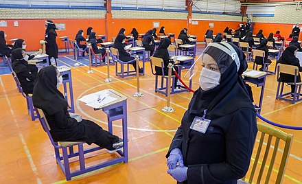 Students take end-of-year exams in Tabriz, Iran, during the pandemic.