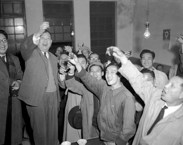Non-Kuomintang politician Wu San-lien (2L) celebrated his landslide victory (65.5%) in the first-time Taipei city mayoral election in January 1951 wit