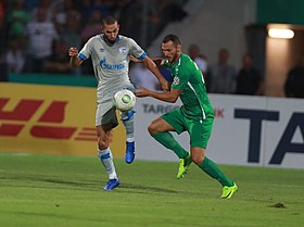 2018–19 DFB-Pokal: Nabil Bentaleb (FC Schalke 04) and Adam Jabiri (FC Schweinfurt 05)