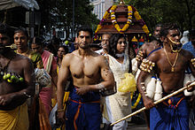 Hindu devotees during Thaipusam festival in Singapore. A day of devotion - Thaipusam in Singapore (4316108409).jpg