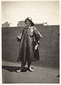 Abbie Ewart in nurse's rain outfit on the roof of the Irving Hotel, New York, May 1918 (MOHAI 7494).jpg