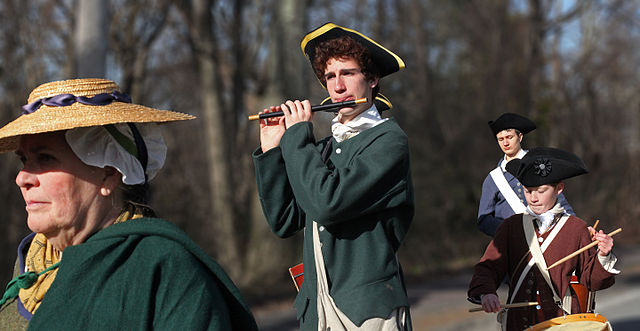 A citizen of Acton and Members of the Acton Fife and Drum Corps march to Concord on the Isaac Davis Trail during the 2016 annual Patriots' Day celebration.