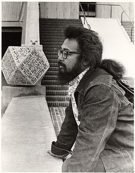Poet Al Robles in front of the Chinese Culture Center, San Francisco,1975. Al Robles, San Francisco poet and housing activist, 1975.jpg