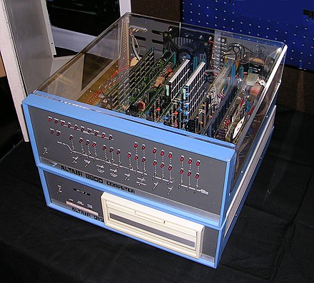 The 1974 MITS Altair 8800 home computer (atop extra 8-inch floppy disk drive): one of the earliest computers affordable and marketed to private / home use from 1975, but many buyers got a kit, to be hand-soldered and assembled.