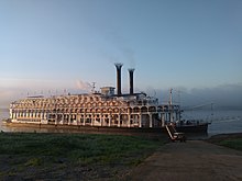 American Queen steamboat docked at the boat ramp located at the end of Ferdinand Street. American Queen Saint Francisville in Morning.jpg