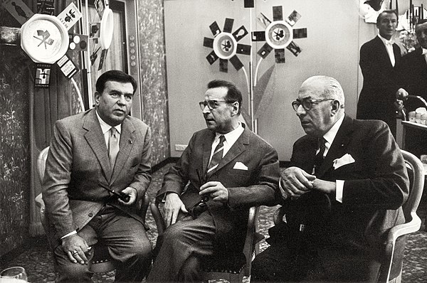 Cervi (left) with the Belgian author Georges Simenon and the Italian publisher Arnoldo Mondadori