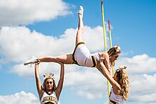 Cheerleaders performing at Homecoming, 2018. Baldwin Wallace Homecoming (29855538977).jpg