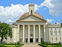 The construction of Neoclassical Saint Vincent de Paul Basilica was dedicated to the return of the city to the Poles. Bdg Bazylika front 6 07-2013.jpg