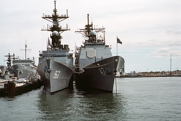 Ticonderoga–class cruisers (right) were built on the same hull as the Spruance-class destroyer (left).