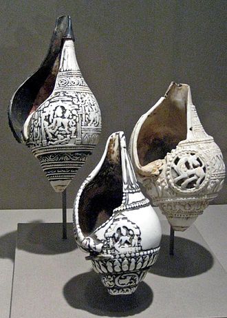 Carved conches or Vamavarta shankhas, circa 11-12th century, Pala period, India: The leftmost one is carved with the image of Lakshmi and Vishnu, and has silver additions. Carved Conch.jpg