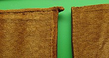 Tablet woven borders on Damendorf Mans trousers (2nd-4th century AD) Damendorf-Man's breeches tabelt weft detail P1011966.JPG