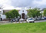 The Divisional Council Offices and the Drostdy Hotel stand just above the so-called Coachman's Cottage. The former is a comparatively recent building, while the Drostdy Hotel is older and has its own history. Although it might be difficult to justify the proclamation of these buildings on strictly historical grounds, they have considerable architectural merit and are of such a character that they fit in well with the Braak and the surrounding buildings. For these reasons and to ensure the preservation of the harmonious appearance of this area the facades of these buildings facing the Braak have been proclaimed. Divisional Council Building (cropped).JPG