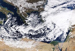 Elpis on January 25. Along with the cyclone, lake-effect snow squalls can also be seen to the north-end of the storm, in the Black and Aegean Seas