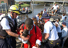 Rescue teams evacuating residents from flooded areas on August 30. FEMA - 17281 - Photograph by Jocelyn Augustino taken on 08-30-2005 in Louisiana.jpg