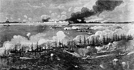 Ships of the North Atlantic Blockading Squadron bombarding Fort Fisher prior to the ground assault, during the American Civil War