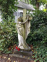 Cemetery cross and tombs