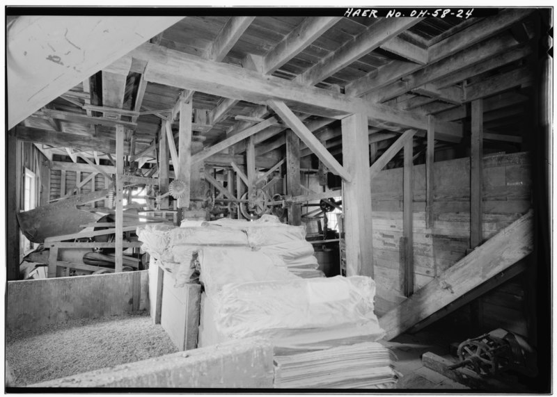File:GENERAL VIEW OF SECOND FLOOR, LOOKING NORTH. CLOCKWISE, RIGHT TO LEFT, ARE THE STAIRWAY TO THE THIRD FLOOR, BAG STORAGE, GRAIN STORAGE BIN, AND RECEIVING SEPARATOR (Robinson HAER OHIO,18-VAVI,2-24.tif
