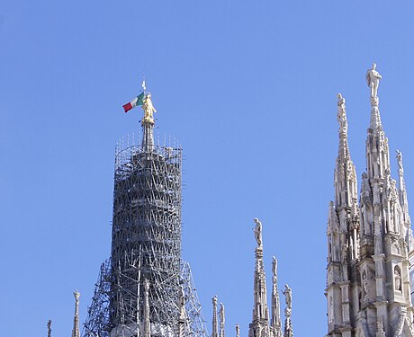 One of the spires of Milan Cathedral scaffolded