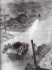 Sd.Kfz. 251-mounted Wurfrahmen in action against Polish positions during the Warsaw Uprising German rocket fire against Polish positions during the Warsaw Uprising.jpg