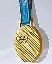 Zlata olimpijska medalja.