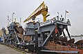 Bucket wheel ship Hansa (portside) on river Weser in Bremerhaven