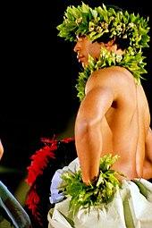 Dancer with `uli`uli, hula kahiko competition, Merrie Monarch Festival 2003 Hula0081110.jpg