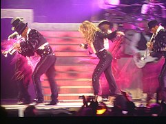 Lopez performing "Let's Get Loud" in Paris on her Dance Again World Tour, 2012. JLO 49 - BERCY - OCTOBRE 2012 (8097672592).jpg