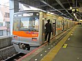 Set 3052 at Aoto Station with the updated orange scheme, November 2019